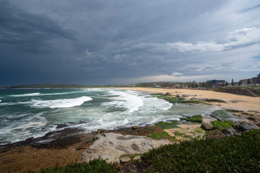 Coastal beach in Australia, highlighting cyclone-prone areas where businesses can benefit from Next Practice Management’s risk assessment and business continuity planning services.