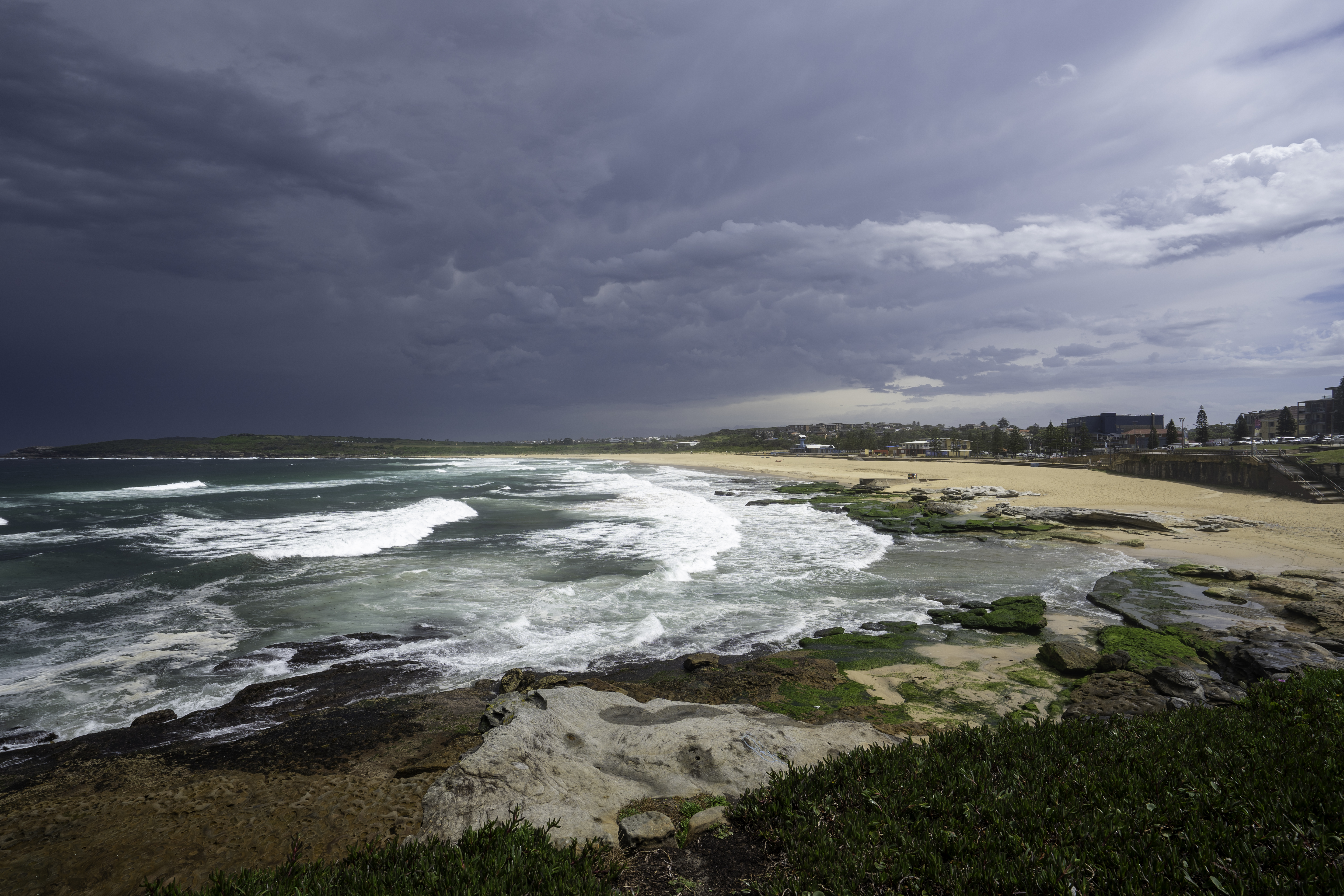 Coastal beach in Australia, highlighting cyclone-prone areas where businesses can benefit from Next Practice Management’s risk assessment and business continuity planning services.